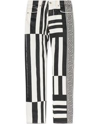 Versace - Jeans With Stripe Pattern - Lyst