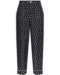 Moschino - Silk Trousers With Print - Lyst