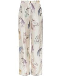 Moschino - Silk Trousers With Print - Lyst