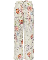 McQueen - Floral Motif Trousers - Lyst