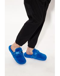 navy blue ugg slides