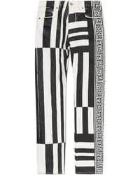 Versace - Jeans With Stripe Pattern - Lyst