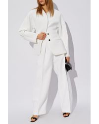 Jacquemus - Pants With Pleats 'Ovalo' - Lyst