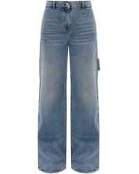 Courreges - Jeans With Asymmetrical Legs - Lyst