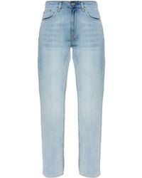 Emporio Armani - Jeans With A Logo-Shaped Appliqué - Lyst