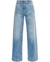 Versace - Jeans With 'Vintage' Effect - Lyst