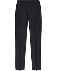 McQueen - Trousers With A Distinctive Skull Motif - Lyst