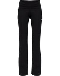 Nike - Flared Leg Trousers - Lyst