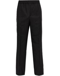 Versace - Wool Pleated Trousers - Lyst