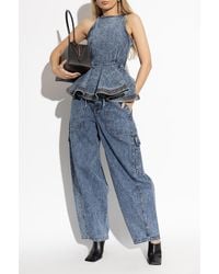 Alaïa - Denim Peplum Top - Lyst