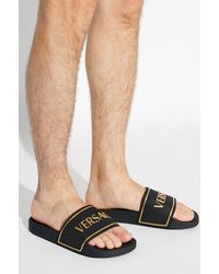 Versace - Rubber Flip-Flops With Logo - Lyst