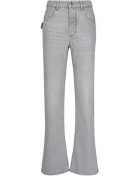 Bottega Veneta - Light Washed Denim Flared Jeans Clothing - Lyst