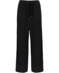 Brunello Cucinelli - Shiny Trims Pantaloni Nero-Donna - Lyst