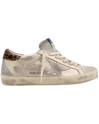 Golden Goose - Sneakers in pelle laminata e suede con patch animalier - Lyst