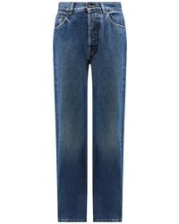 McQueen - Stylish Cotton Jeans With Leather Logo Patch - Lyst