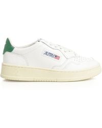 Autry - Medalist sneakers basse in pelle bianche & verdi - Lyst