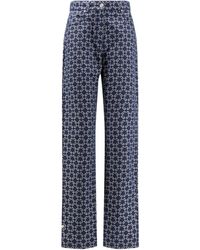 Givenchy - All-Over Logo Jeans - Lyst