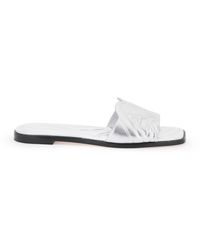 Alexander McQueen - Laminated Leather Slides With Embossed Seal Logo - Lyst