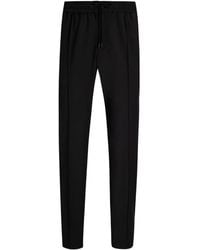 Dolce & Gabbana - Drawstring-Waist Wool Blend Tapered Trousers - Lyst