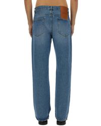 Jacquemus - Indigo denim distressed wide leg jeans - Lyst