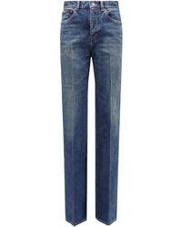 Saint Laurent - Jeans in cotone con patch logo posteriore - Lyst
