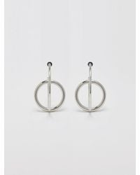 VIOLLINA Crossed Round Hoop Earring - Metallic