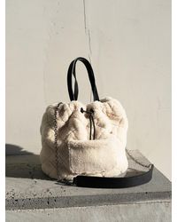 teddy faux fur bucket bag