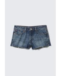 Monki - Low Rise Raw Hem Mini Denim Shorts - Lyst