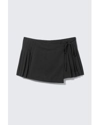 Monki - Low Rise Pleated Mini Wrap Skirt - Lyst