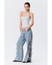 Monki - Imoo Low Rise Loose Wide Bow Jeans - Lyst