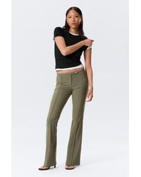 Monki - Low Rise Skinny Flared Leg Trousers - Lyst