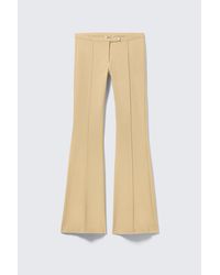 Monki - Low Rise Skinny Flared Leg Trousers - Lyst