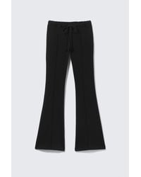 Monki - Mid Rise Pintuck Flared Sweatpants - Lyst