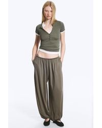 Weekday - Soft Mid-Rise Balloon Trousers - Lyst