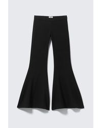 Monki - Low-Rise Flared Trousers - Lyst
