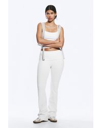Weekday - Folded Waist Flared Yoga Tights - Lyst