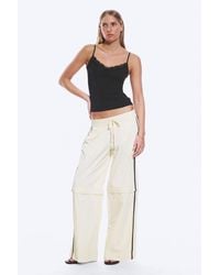 Monki - Zip-Off Nylon Track Trousers - Lyst