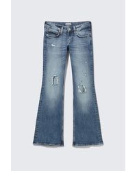 Weekday - Hour Low Rise Skinny Bootcut Distressed Jeans - Lyst