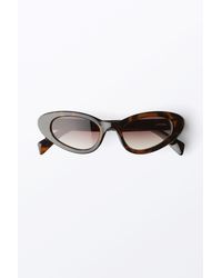 Monki - Cat-Eye-Sonnenbrille Mit Geschwungenen Bügeln - Lyst