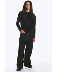 Weekday - Astro Mid Rise Baggy Faux Leather Pocket Jeans - Lyst