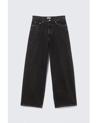 Weekday - Astro Mid Rise Baggy Faux Leather Pocket Jeans - Lyst