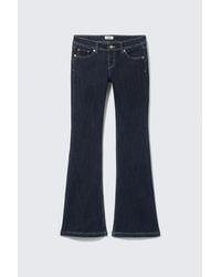 Monki - Low Rise Slim Flared Jeans - Lyst