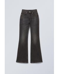 Weekday - Glow Curve High Waisted Regular Flared Jeans - Lyst