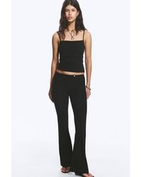 Monki - Low Rise Skinny Flared Leg Trousers - Lyst