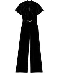 Yumi' - Velvet Jumpsuit With Twist Neckline And Buckle Belt - Lyst
