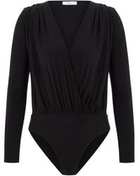 Maan Istanbul - Deep V-Neck Bodysuit - Lyst