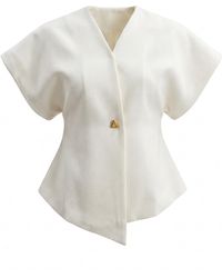 Modenaire - Textured Wrap Top With Cap Sleeves And Asymmetric Hem - Lyst