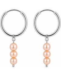 Pearl Code - Peach Pearl Huggie Earrings – Small Hoops - Lyst