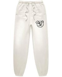 X Ilona Blue - Neutrals Graffiti Teddy Bear Cotton Cream Vintage Wash Joggers - Lyst