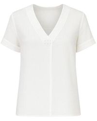 Conquista - Neutrals Cream V Neck Top With Metallic Motif - Lyst